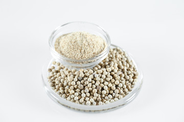 Ground White Pepper Isolated in white.