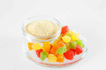 Gelatin and colorful jelly isolated on white.