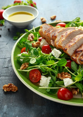 Fresh Grilled Chicken salad with tomatoes, feta cheese and vegetables