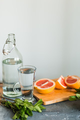 Citrus and lemonade on the table in summer