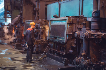 Fototapeta na wymiar Workers in the steel mill.