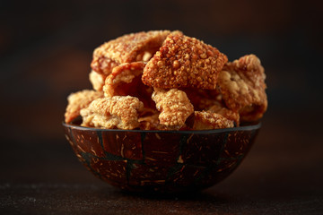 Crispy Pork scratchings. deep fries in bowl