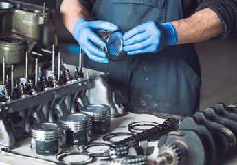 Master collects a rebuilt motor for the car..