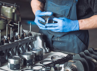 Master collects a rebuilt motor for the car..