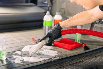 Car chemist. Chemical treatment of the car trunk.