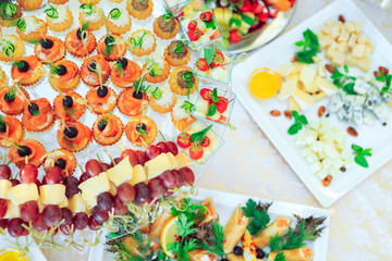 Background of party appetizers on wooden sticks