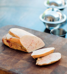 Goose liver on a wooden Board in the restaurant before cooking. © davit85