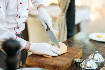 Goose liver on a wooden Board in the restaurant before cooking. © davit85