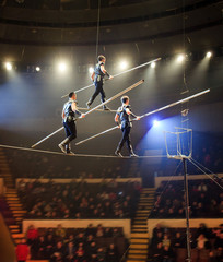 Tightrope walkers at the circus.