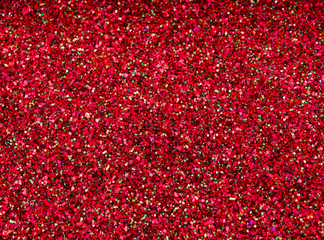 Background sequin. RED BACKGROUND. glitter surfactant. Holiday abstract glitter background with blinking lights. Fabric sequins in bright colors. Fashion fabric glitter, sequins.	