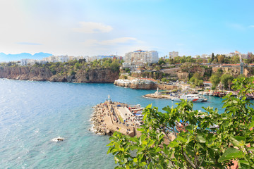 Mediterranean landscape in Antalya. View of the mountains, sea, yachts and the city