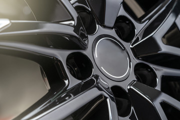 beautiful alloy wheels dark background, close up.