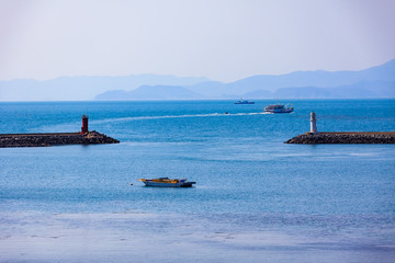 Obraz premium Blue Sea and Island