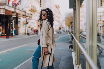 Beautiful afro american woman standing on the street