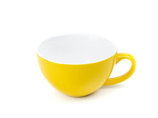 Yellow ceramic mug empty isolated on the white background.Mockup template for design or advertising