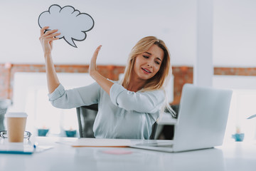 Woman trying to stop thoughts while sitting in front of the laptop