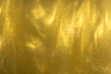 Gold background, golden mother of pearl texture