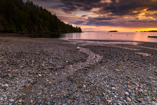 Sunset scenic landscapes of rocky beaches and mountains of the Pacific North West's Bowen Island in Howe Sound close to Vancouver Canada.  Fine art photography for web or office.