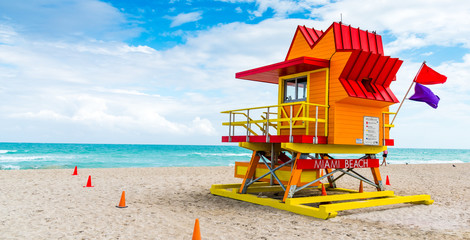 Lifeguard tower in Miami Beach under a cloudy sky