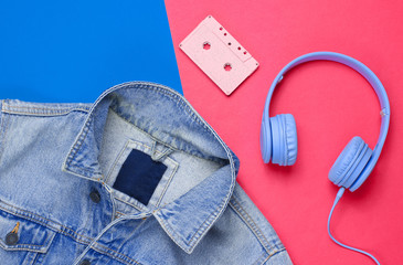 Pop culture attributes eighties. Denim jacket, headphones, audio cassette on a blue-red background....