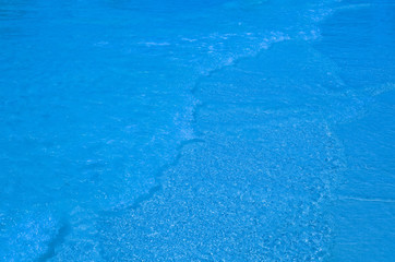 clear waves are sweeping water 
