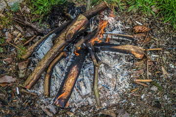 Obraz premium Bonfire in a meadow in daytime