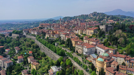 Fototapeta premium Aerial drone photo of iconic and beautiful old fortified upper Medieval city of Bergamo, Lombardy, Italy