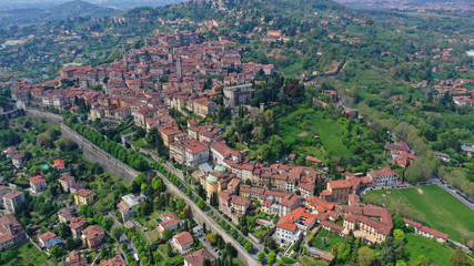 Aerial drone photo of iconic and beautiful old fortified upper Medieval city of Bergamo, Lombardy, Italy