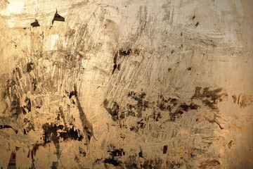 Abstract background. Window chaotically smeared with paint, illuminated by the sun.