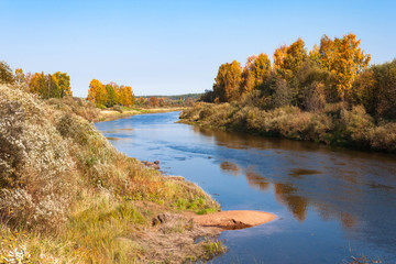 Autumn blue sky bend in the river with sandy bank in Vologodskaya oblast, Russia