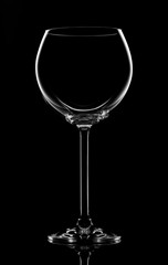 Transperent wineglass on black