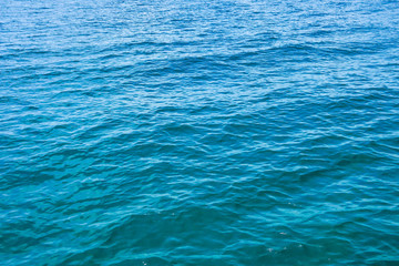 Surface of a ocean beach water in Phu Quoc Vietnam in daylight | Calm waves