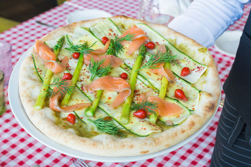 Pizza with salmon