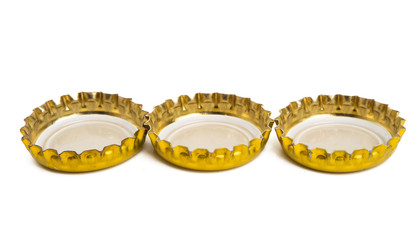golden tin beer cap isolated