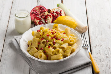 pasta with leek cream sauce pomegranate and lemon peel