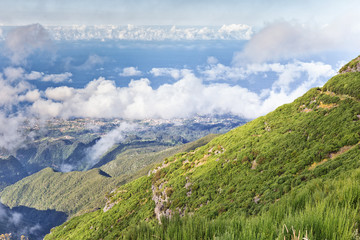 View of the coast of the island of Madeira, Portugal from the tourist path to the peak of Ruivo.