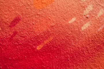 closeup of red painting on the wall texture