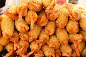 Street local cuisine of Vietnam. Tasty tempura shrimp food background. Selective focus