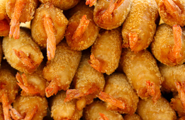 Popular street cuisine of Vietnam. Tempura shrimp food background. Selective focus