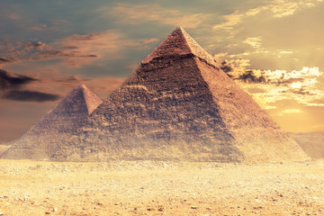 Fototapeta na wymiar The Pyramid of Khafre and the Pyramid of Cheops, Giza desert, Egypt