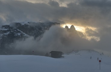 Italian Alpe di Siusi, sunset during clouds. Dolomiten Alps.