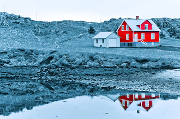 View of the beautiful red house at Stykkisholmur town in western Iceland in winter.