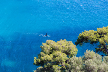 parga sea island blue among green pine trees greece