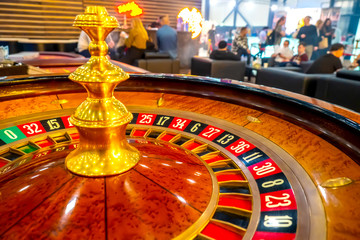 Roulette. Casino. A table with a tape measure. Roulette wheel in a casino. Bets on gambling. Luck. Cash games. Gambling in the United States. Lose money