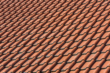 Close up view of red ceramic rooftop, roof cover on housetop
