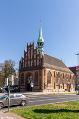 Historic church in Brick Gothic at blue sky, Poland, Szczecin