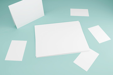 Stack of blank whate paper sheets mock-up on blue background. 3D Render Illustration of realistic mockup design.