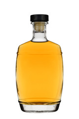 Glass bottle filled with brandy or whisky with a stopper isolated on a white background