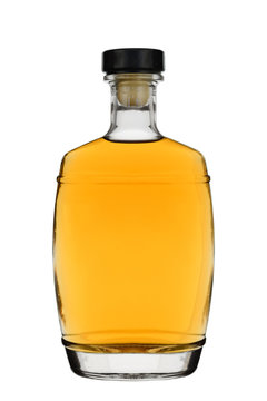 Glass Bottle Filled With Brandy Or Whisky With A Stopper Isolated On A White Background