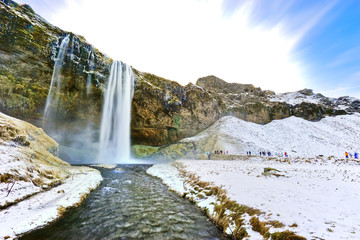 Obraz premium View of Seljalandsfoss waterfall in the morning in winter in Iceland.